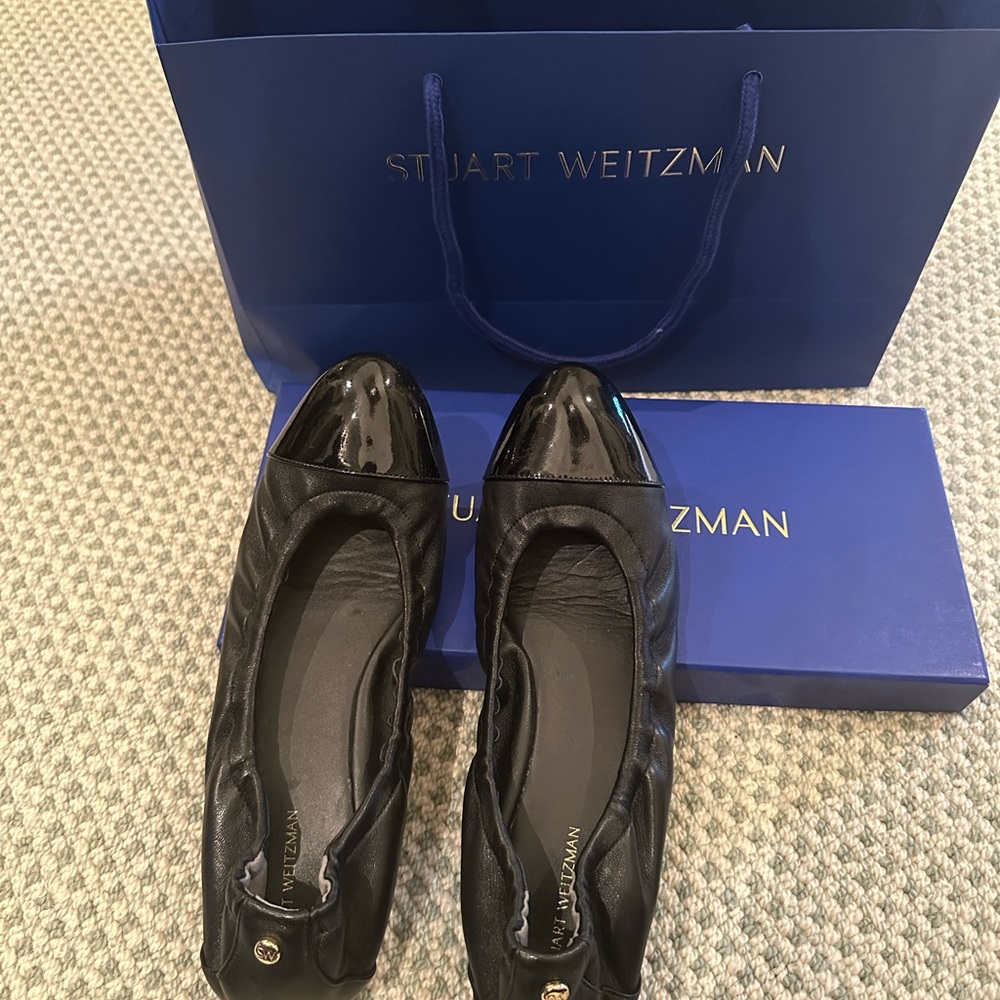 8.5 Stuart Weitzman Black Ballet flats. No signs of wear, only wore once.